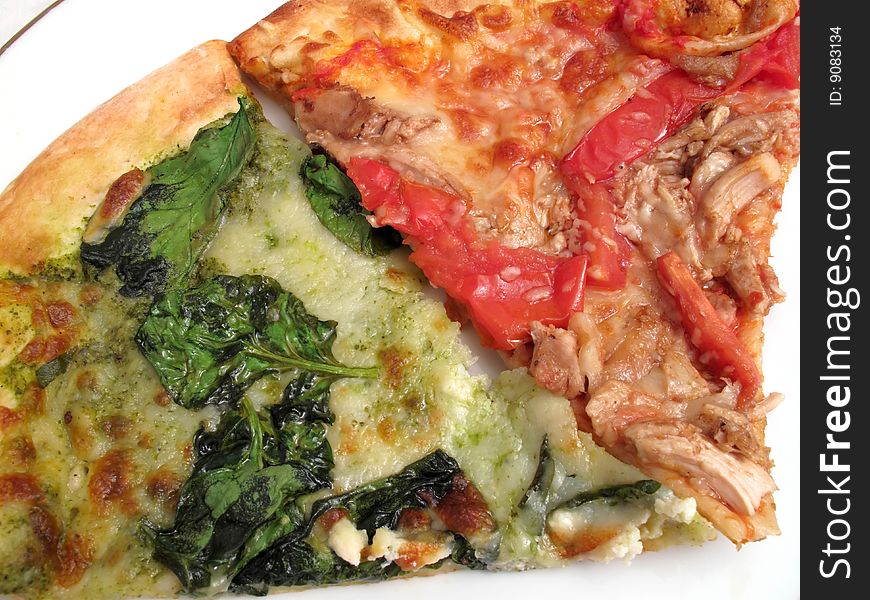 Photo of slices of pizza made from organic ingredients.  On the left is a spinach and ricotta pizza slice.  On the right is a chicken, tomato and balsamic vinegar pizza slice. Photo of slices of pizza made from organic ingredients.  On the left is a spinach and ricotta pizza slice.  On the right is a chicken, tomato and balsamic vinegar pizza slice.