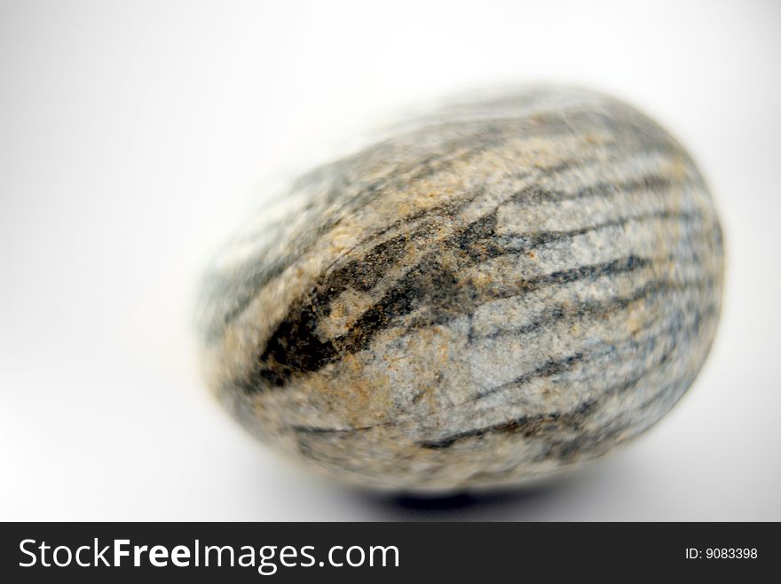 Round stone with neutral background