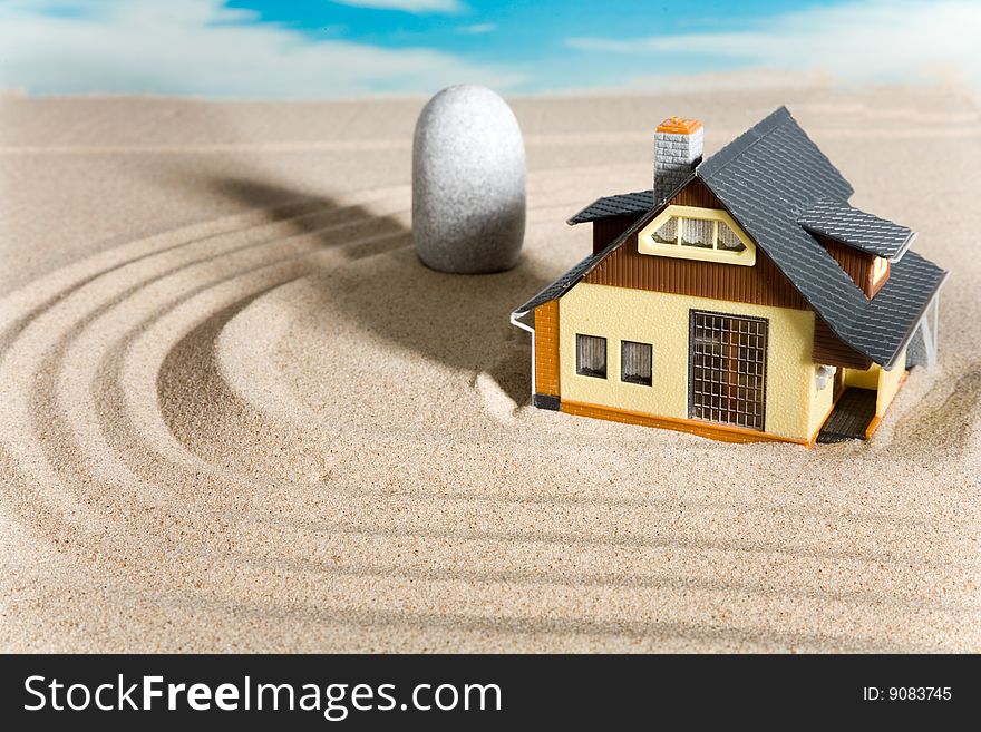 House on sand. Real estate concept