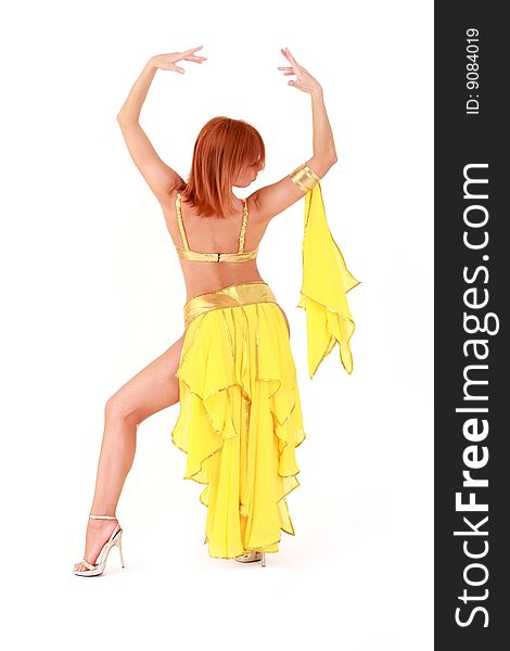 Nice dancing woman in yellow dress isolated over white. Nice dancing woman in yellow dress isolated over white