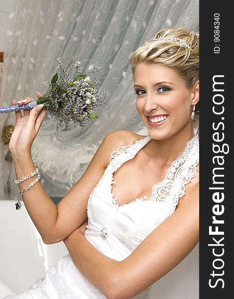 Beautiful Blond bride wearing diamond jewelery and tiara. Beautiful Blond bride wearing diamond jewelery and tiara