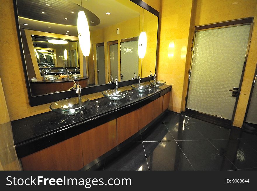 The interior of a luxurious and nicely decorated restroom.