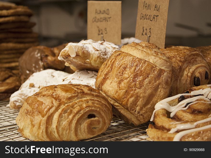 Close up of sweet croissants in a bakery. Close up of sweet croissants in a bakery.