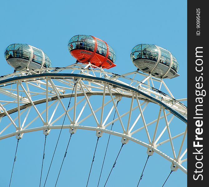 A close up of the capsules on the London Eye, a giant Ferris wheel in London, England.