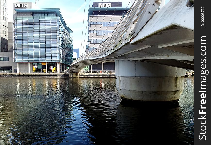 The BBC offices at Media City and the footbridge in Manchester, United Kingdom. The BBC offices at Media City and the footbridge in Manchester, United Kingdom.