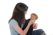 Girl Playing With Doll 2 Stock Photo