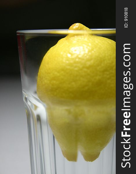 Lemon in a glass. Lemon in a glass