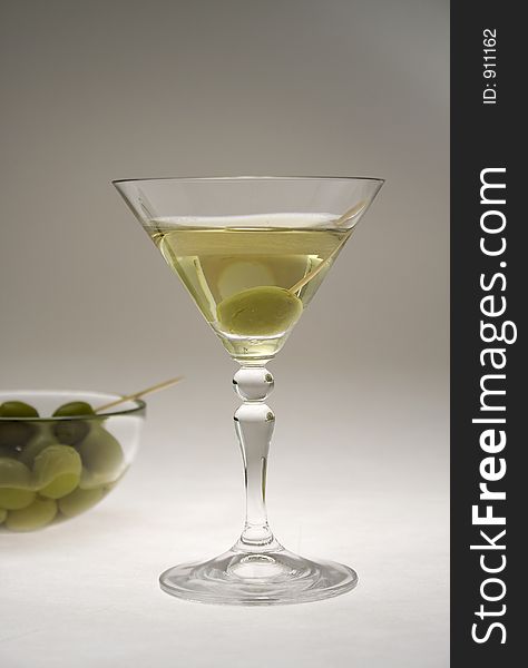 Martini glasses and olives. Martini glasses and olives