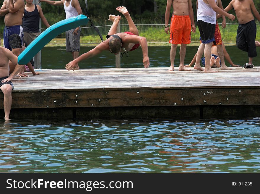 Life guard diving into water. Life guard diving into water