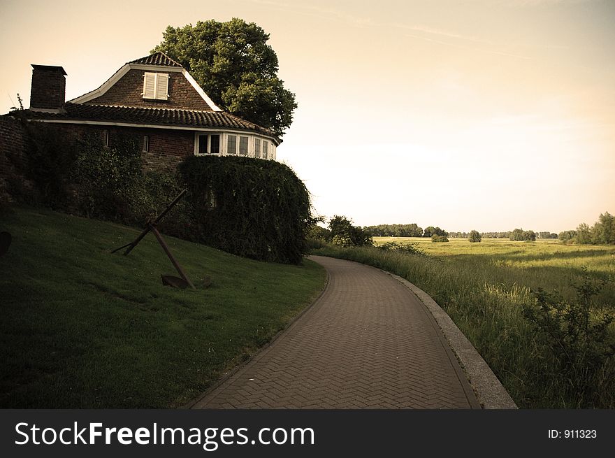 A small home in holand overlooking a field. A small home in holand overlooking a field.