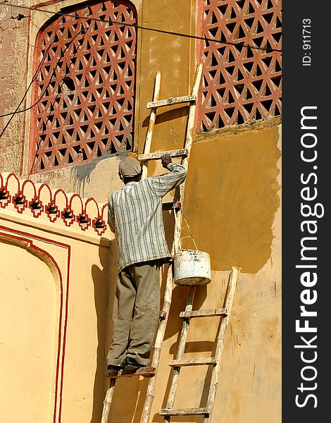 Working man in streets of India