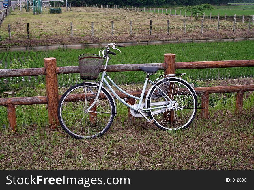 Bicycle standing on a fence. Bicycle standing on a fence