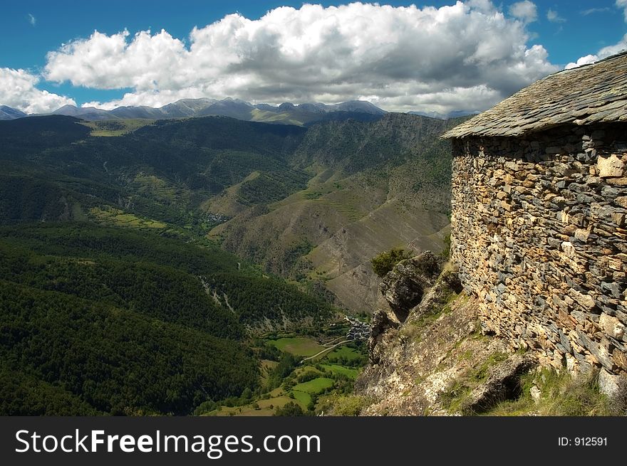 Northern Catalonia,Spain,Pyrenees,looking at the valley below,near an ancient church on top of the  mountain. Northern Catalonia,Spain,Pyrenees,looking at the valley below,near an ancient church on top of the  mountain