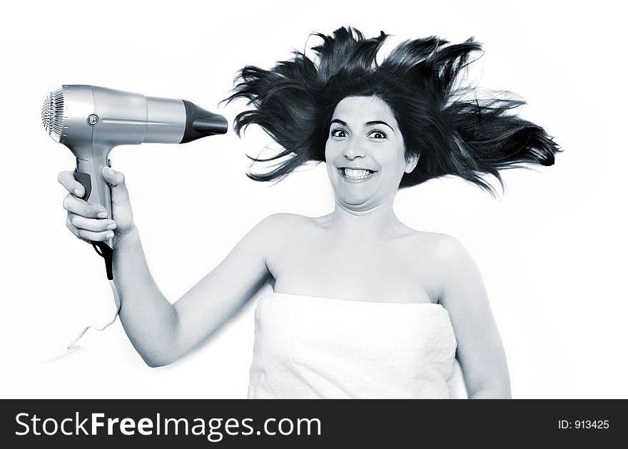 Young beautiful woman drying is hair. Young beautiful woman drying is hair