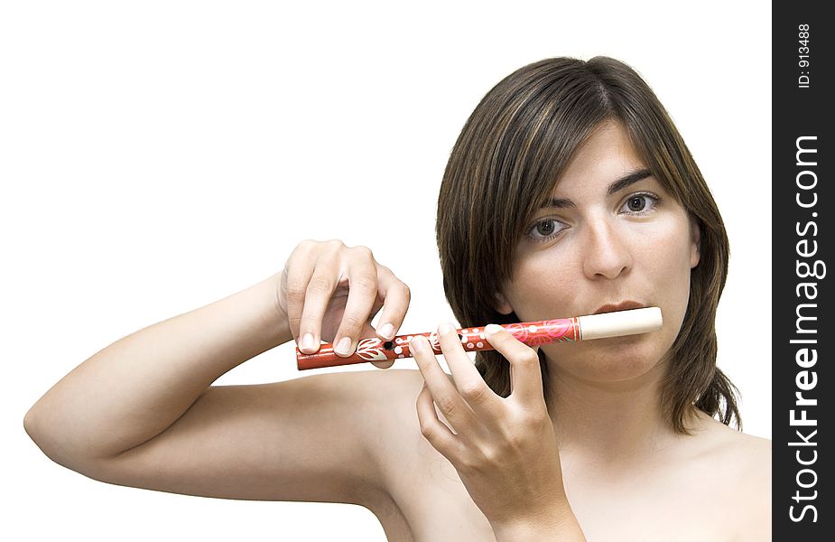 Woman making music with a flute. Woman making music with a flute