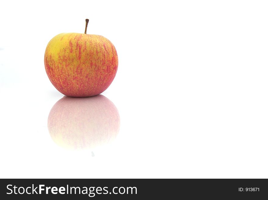 Red Apple isolated in a white background with reflection