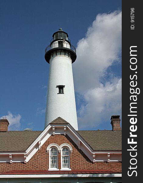 Lighthouse and roof of brick building