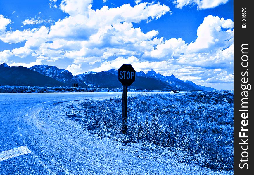 Roadside shot of the Teton mountains with blue effect. Roadside shot of the Teton mountains with blue effect.