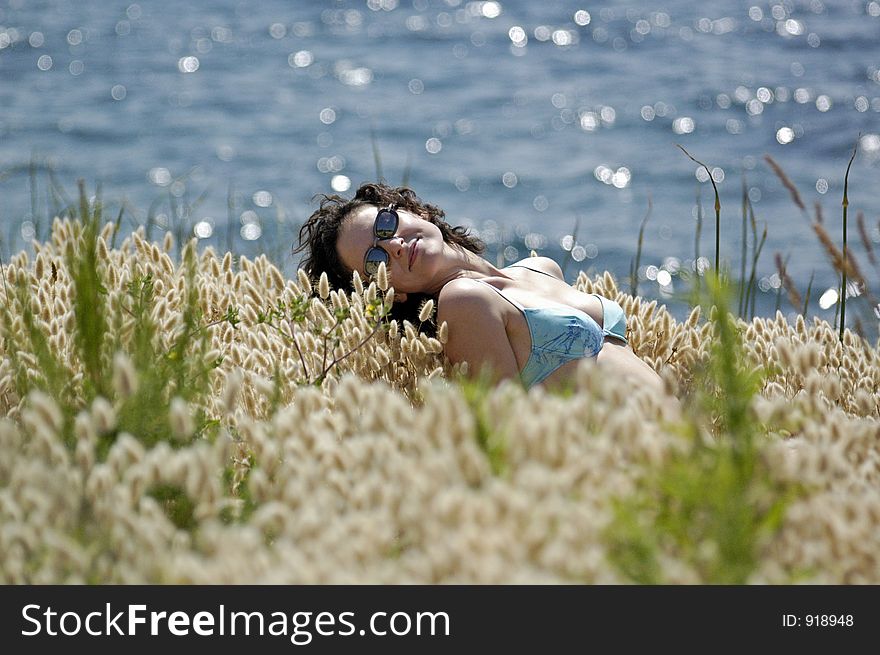 Girl lie in grass