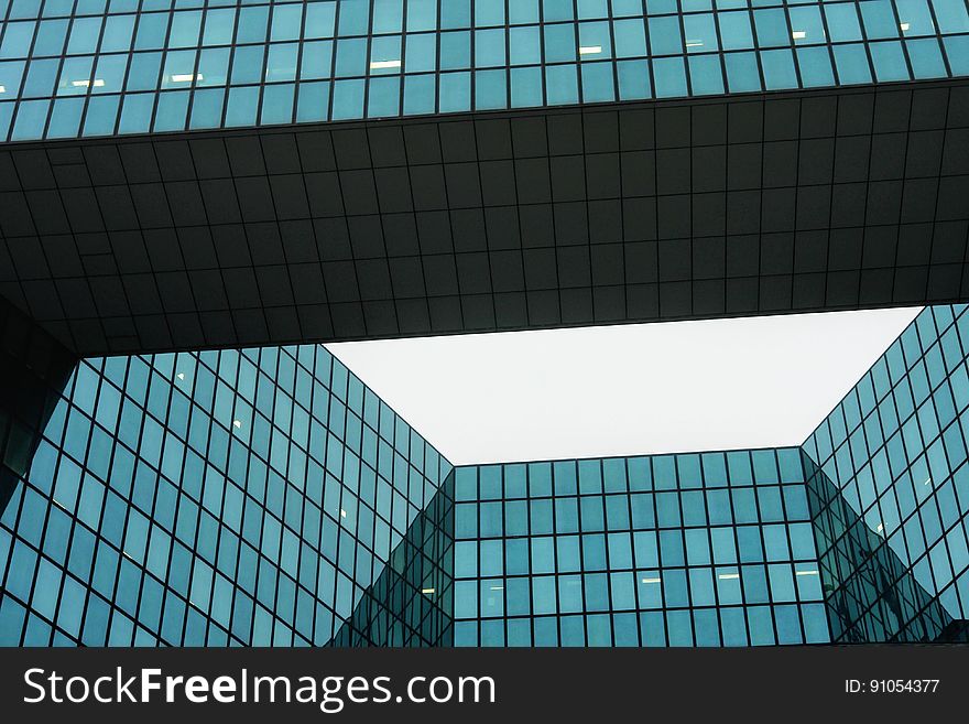 A modern business building from the ground level.