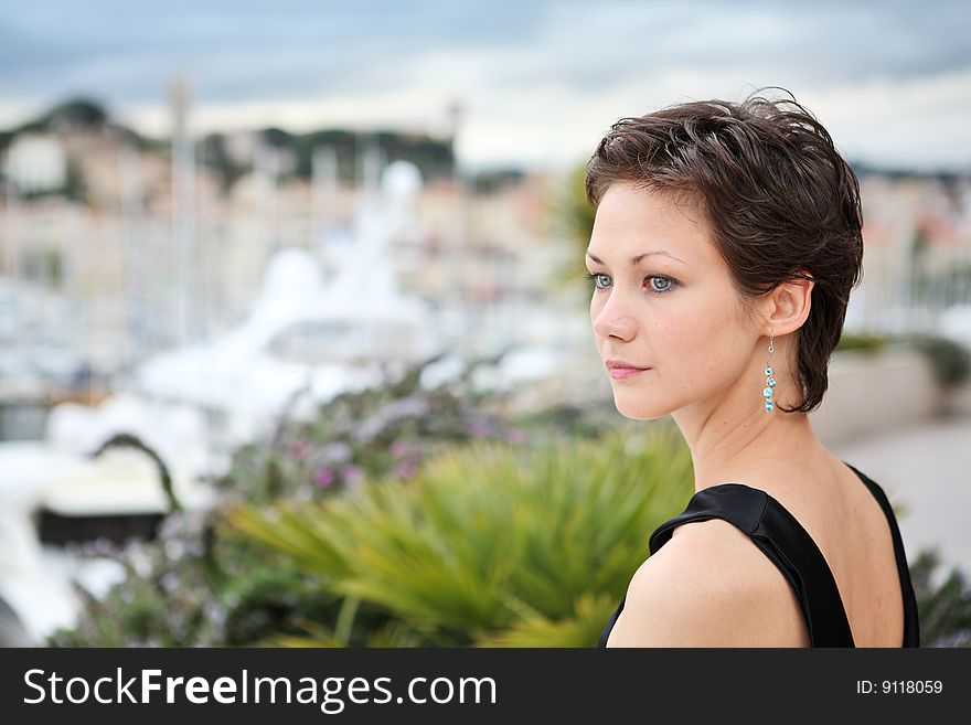 Beautiful model on the balcony of Palais des Festivals in Cannes, France. Beautiful model on the balcony of Palais des Festivals in Cannes, France