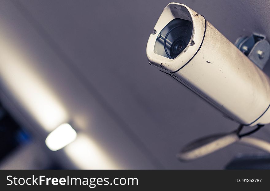 White And Gray Surveillance Camera In Macro Photography