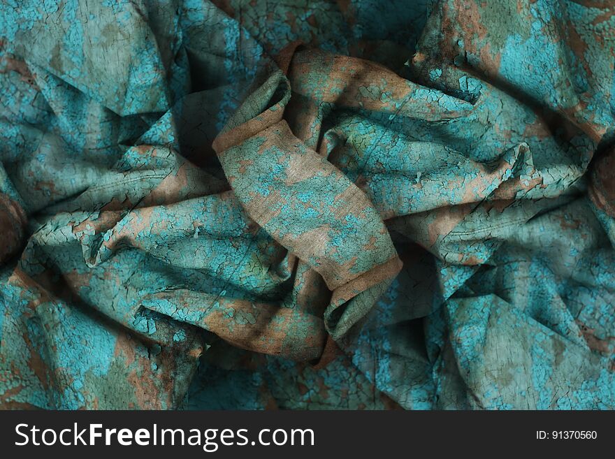 Crumpled fabric cloth texture. Grunge background.