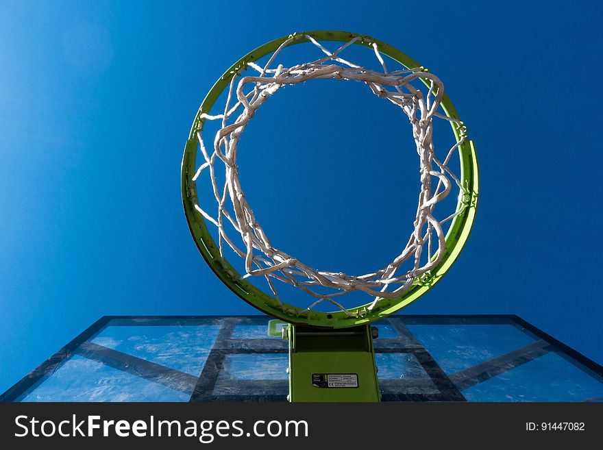 Worm View Photography of Green and Black Basketall Hoop
