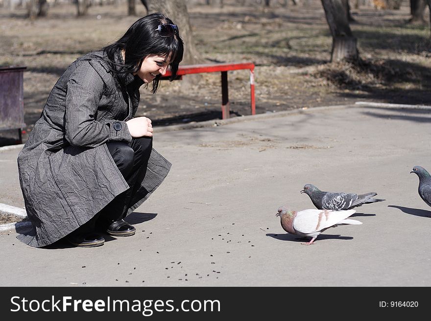 Girl Feeding Birds