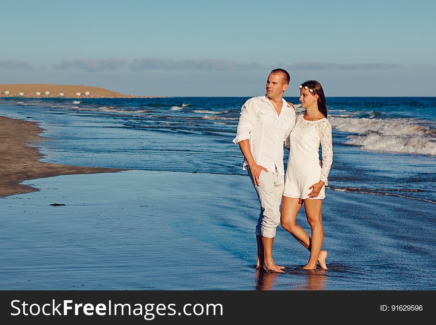 Man And Woman Near Seashore