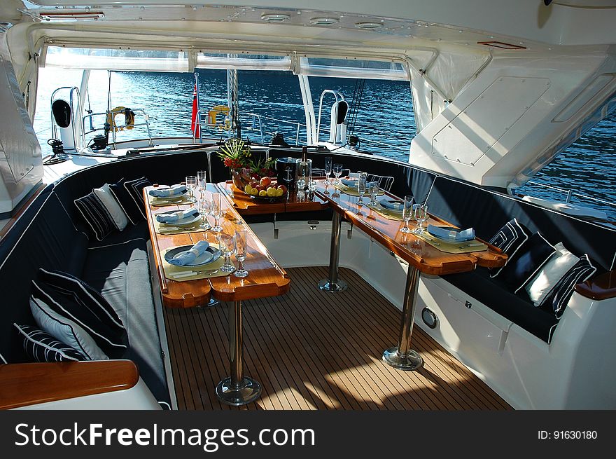 An elegantly set table on a yacht. An elegantly set table on a yacht.