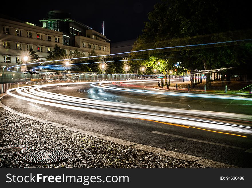 City traffic at night with light trails. City traffic at night with light trails.
