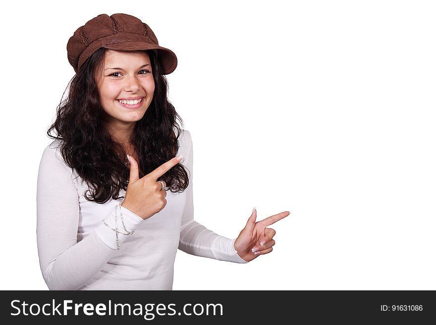 Woman in White Sweater Smiling With White Background