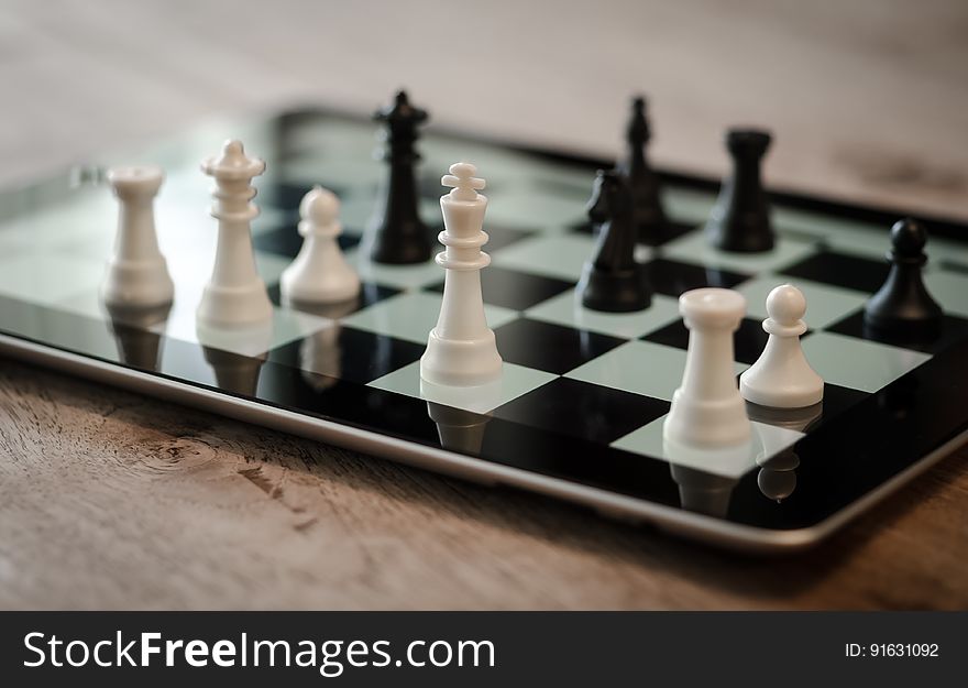 Tilt Shift Lens Photo Of Black And White Chess Pieces