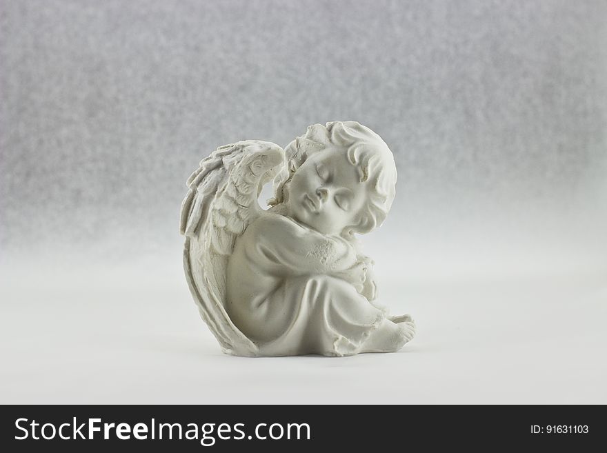 White Angel Sitting Figurine
