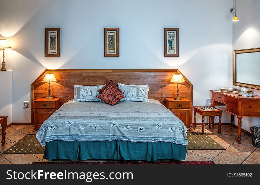 A classic bedroom interior with a double bed.