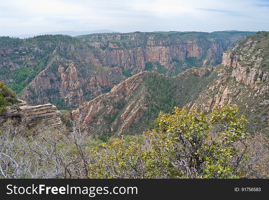 View into Secret Canyon from Little Round Mountain. We headed out of Flagstaff down Woody Mountain Road for a week of camping and day hiking around the Rattlesnake Mesa area. The area is north of Sedona&#x27;s Secret Canyon, on top of the Mogollon Rim. There are several trails, mostly unmaintained, heading along or off the edge of the Rim. For the first day&#x27;s hike, we headed for FS Trail #9, which heads across Little Round Mountain and along the Rim around South Pocket. Read the blog entry for this hike