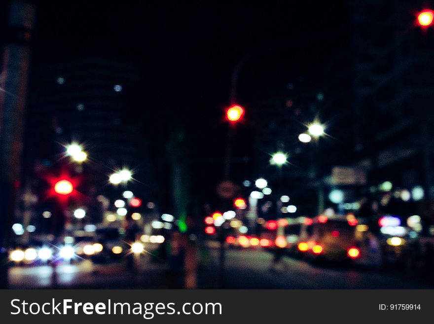 A night street in soft focus.