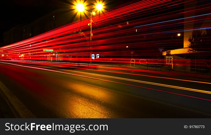 A night view of a city with a long exposure of the passing traffic. A night view of a city with a long exposure of the passing traffic.