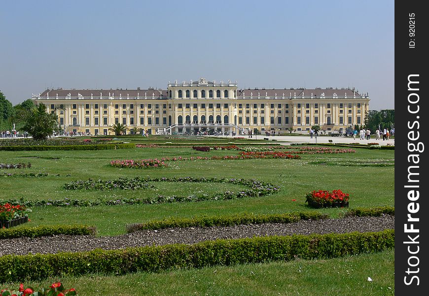 Vienna castle with park and flowers in front