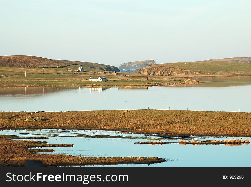 Tranquil vista over Spiggie loch in the Shetland Islands. Tranquil vista over Spiggie loch in the Shetland Islands