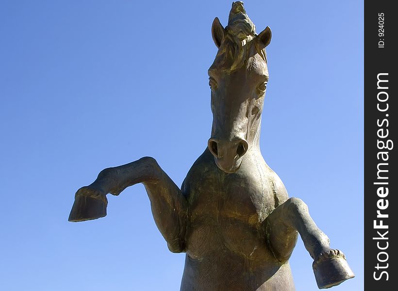 Statue of a horse standing on hind legs