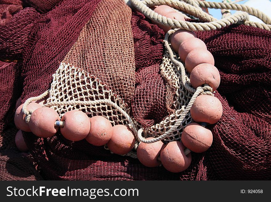 Red fishing net - Horizontal Close-up. Red fishing net - Horizontal Close-up.