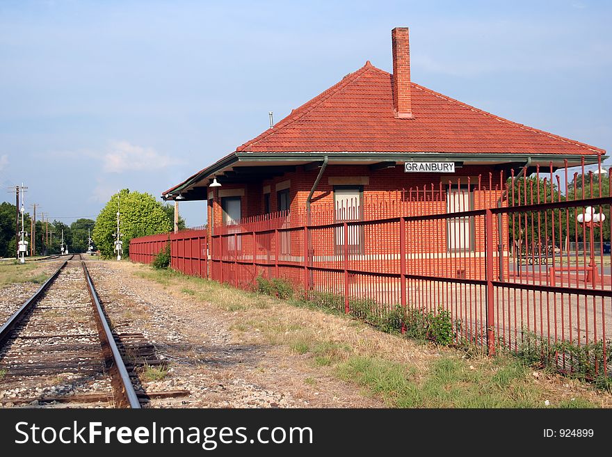 Early 20th century depot in small Texas town. This station stopped being used by the railroad in the 1970's but still stands in tribute to the architecture of the early part of the century. Early 20th century depot in small Texas town. This station stopped being used by the railroad in the 1970's but still stands in tribute to the architecture of the early part of the century.