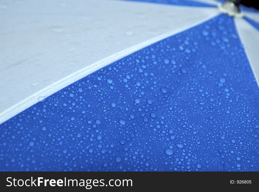 Water droplets and umbrella