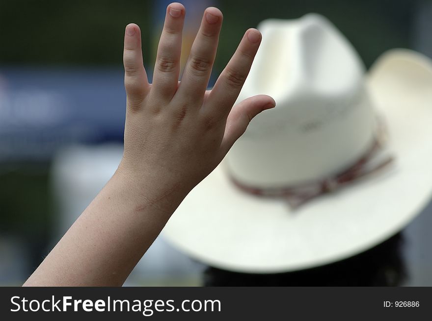 Child's hand in the air