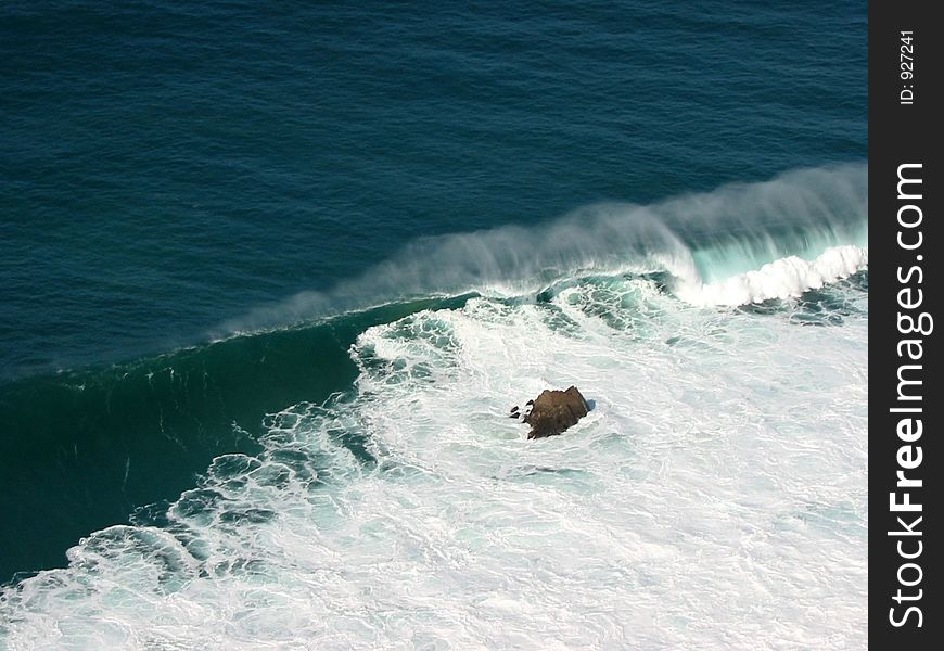 Atlantic Ocean wave towards the cliffs of Cabo da Roca, Portugal