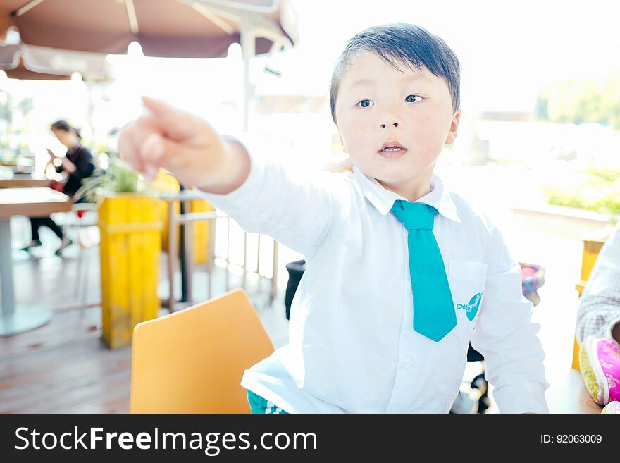 Chinese boy on the street in school uniform