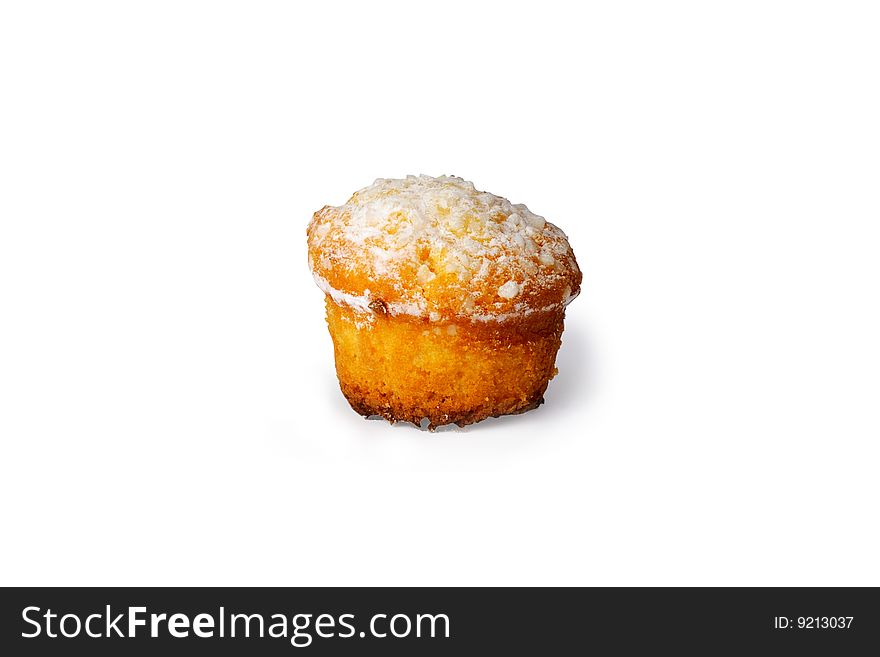A single small muffin with sugar icing. A single small muffin with sugar icing
