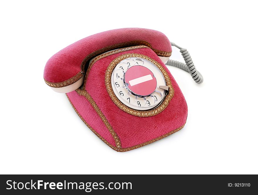 Red phone with dial plate on isolated background
